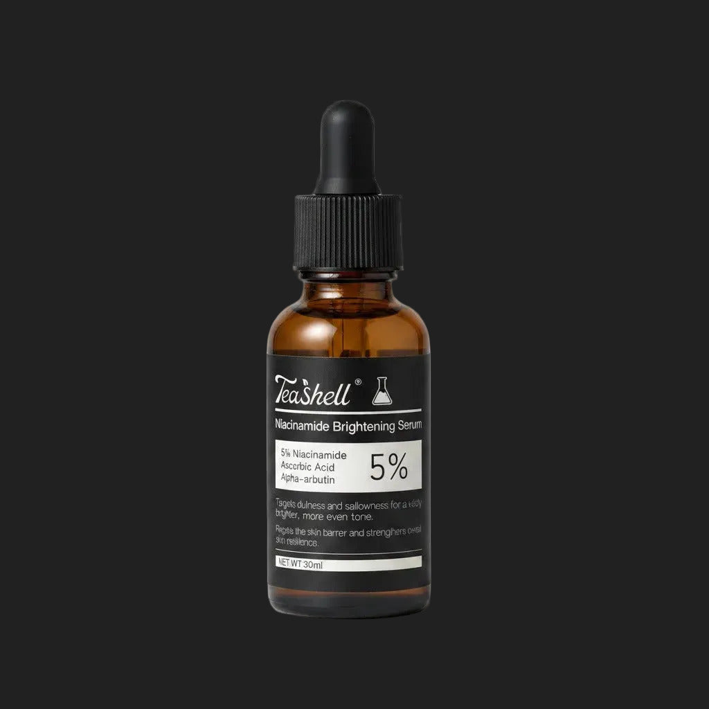 TeaShell niacinamide brightening serum bottle on a white background