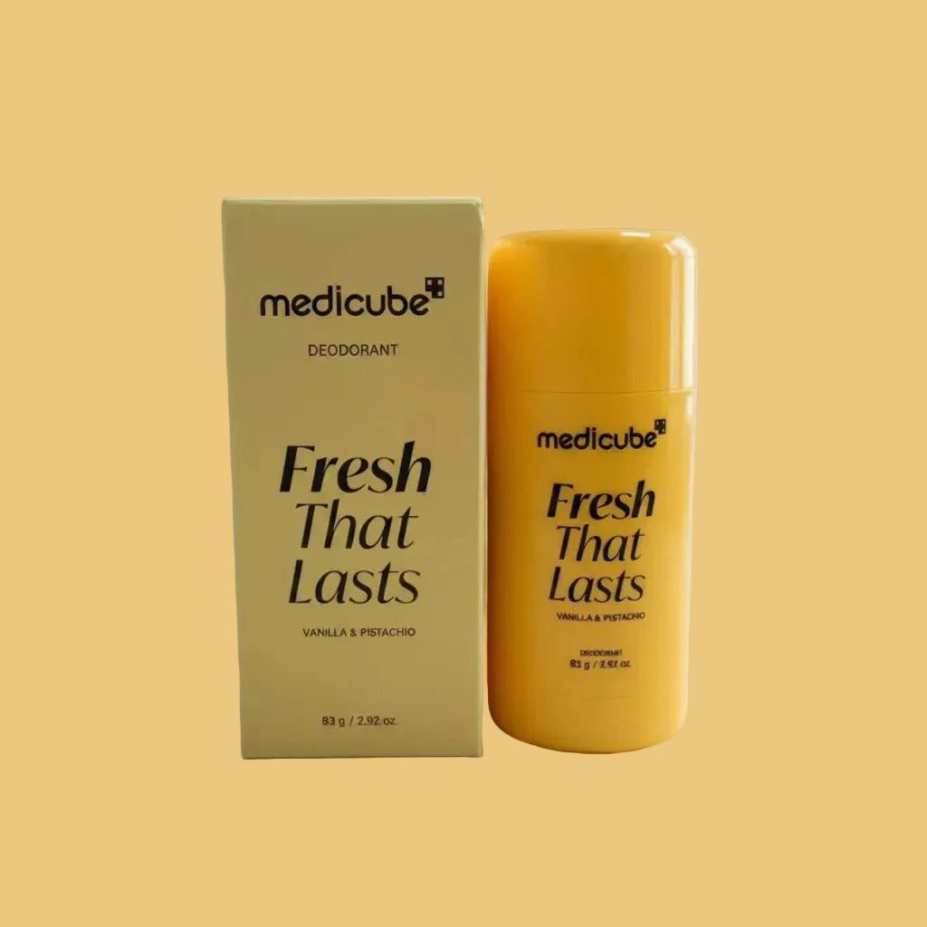 Yellow Medicube deodorant bottle and packaging on a white surface